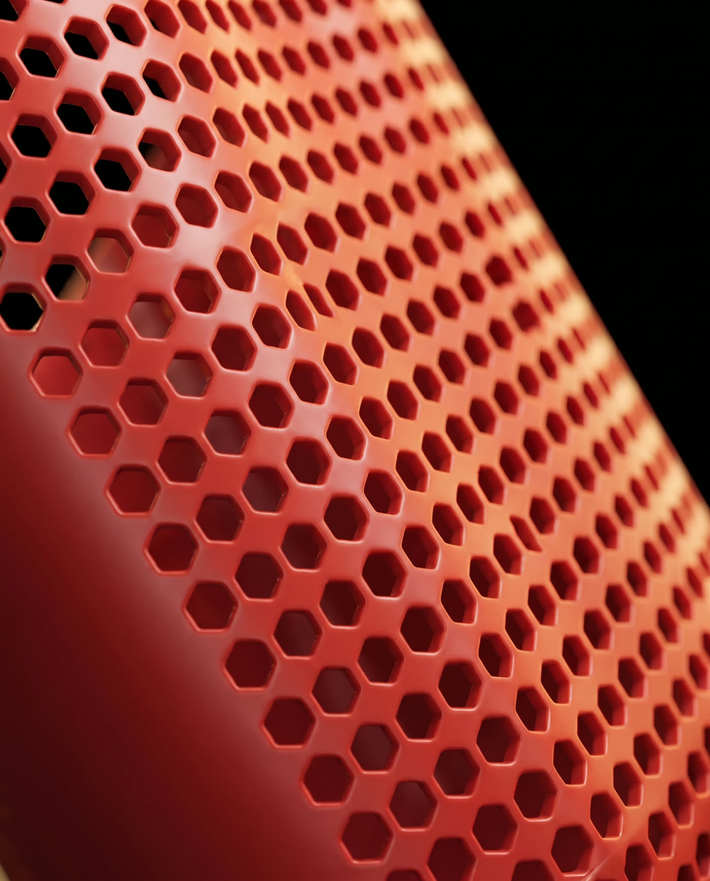 Macro detail of the SCOOP ONE Hexcore hexport grid in raking light